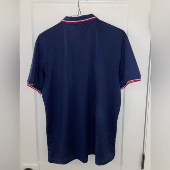 Navy polo with red trim, 100% polyester ￼ - Picture 3 of 3